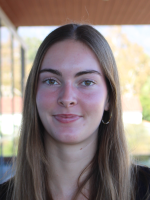 Sweet faced young lady with long straight hair